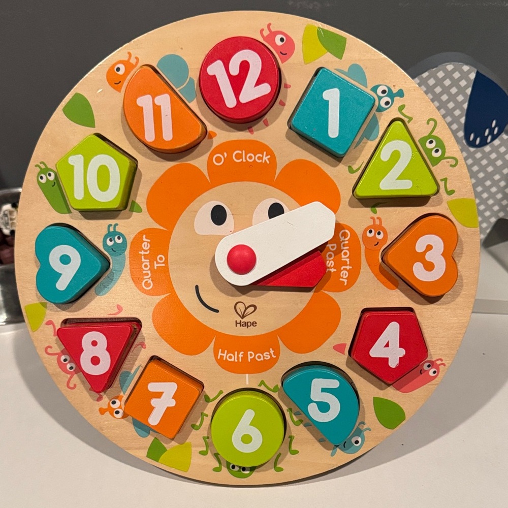Hape wood clock puzzle